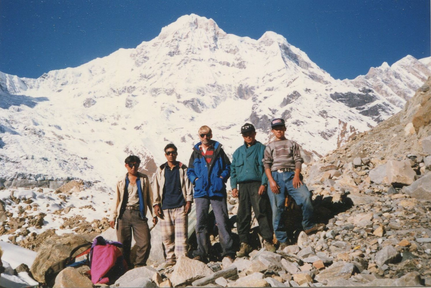 Trekking crew beneath Annapurna South Peak