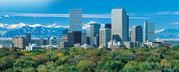 Skyscrapers of Denver beneath the Rocky Mountains in Colorado, USA