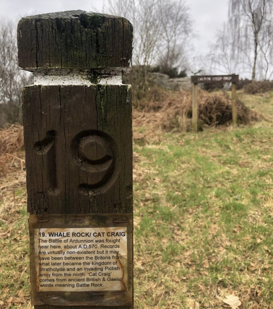 Battle signpost in Ardinning Loch Wildlife Reserve and the Campsie Fells