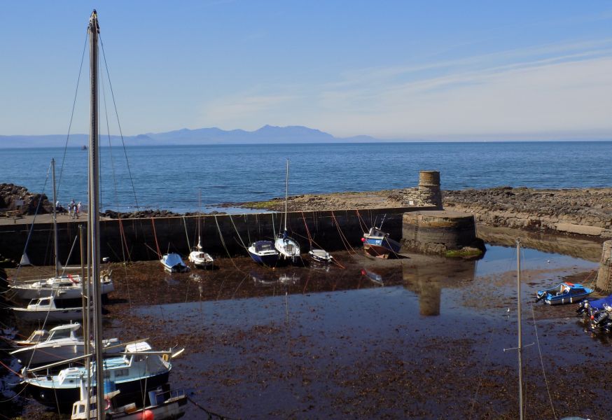 Hills of Arran beyond Harbour at Dunure